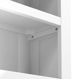 A monochrome corner of an empty shelving unit with clean lines and a minimalist design, featuring subtle shadows indicating an indoor setting.