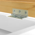 A metal hinge connects a white surface to a wooden one, suggesting a furniture assembly, on a plain background.