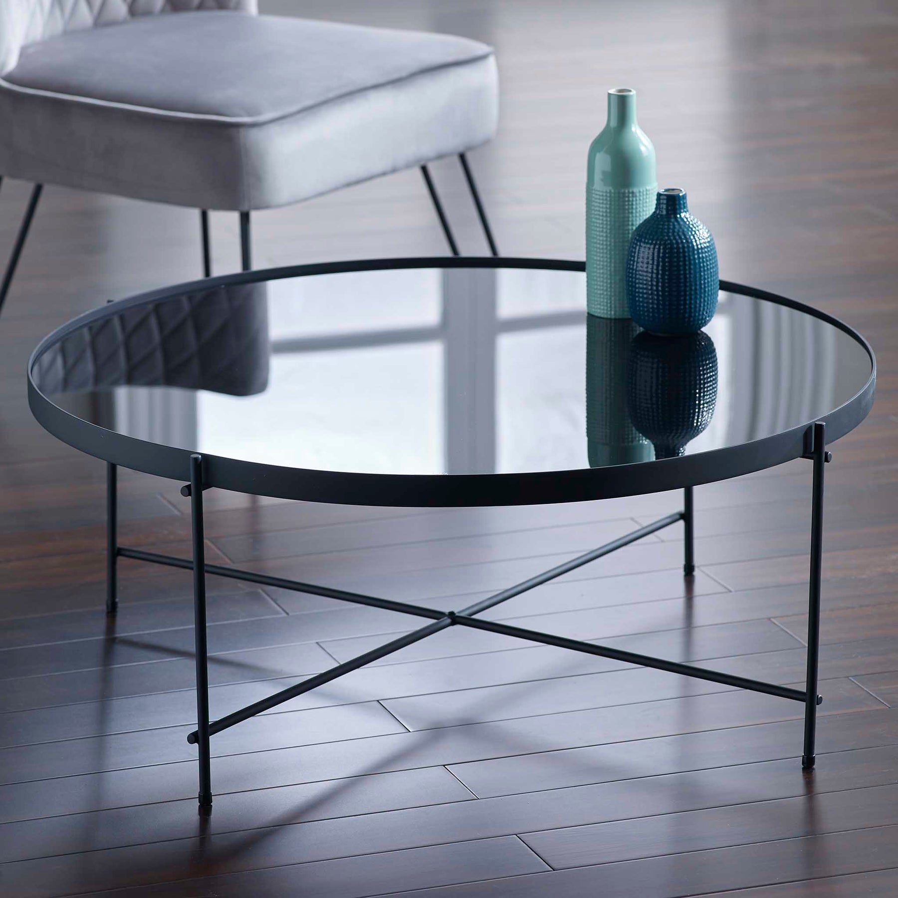 Arla Black Metal Round Coffee Table with mirrored top Lifestyle