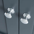 Close up of the round metal handles on the Chichester Charcoal Black Corner Cupboard
