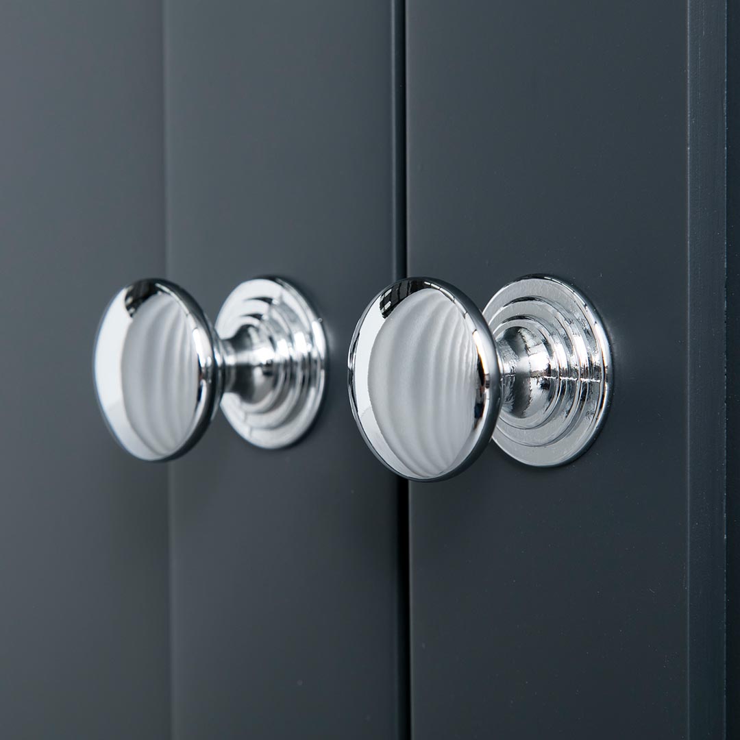 Close up of the round silver handles on the Chichester Charcoal Black Corner Cupboard