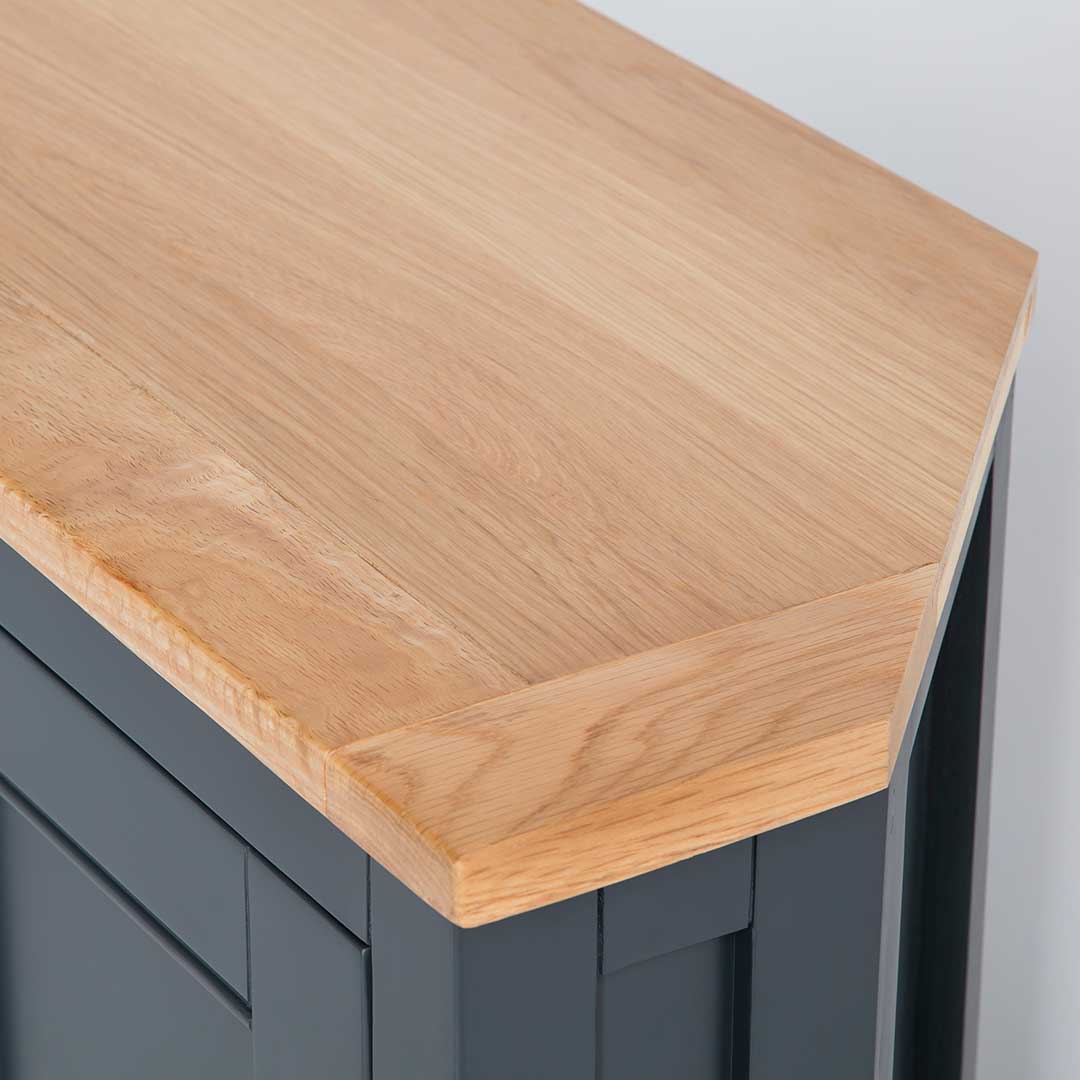 Close up of the oak top on the Chichester Charcoal Black Corner Cupboard