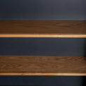 close up of oak shelves on the Chichester Charcoal Small Bookcase 