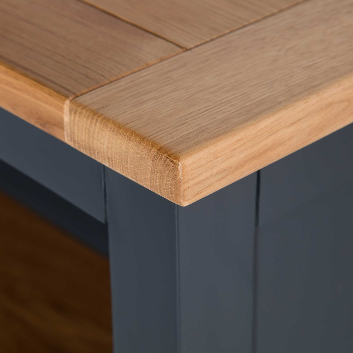 close up of the oak top corner on the Chichester Charcoal Small Bookcase 