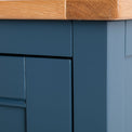 Close up of the painted blue solid wood frame on the Chichester Stiffkey Blue Mini Cupboard