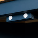 Close up of the door stoppers on the Chichester Stiffkey Blue Corner Cupboard