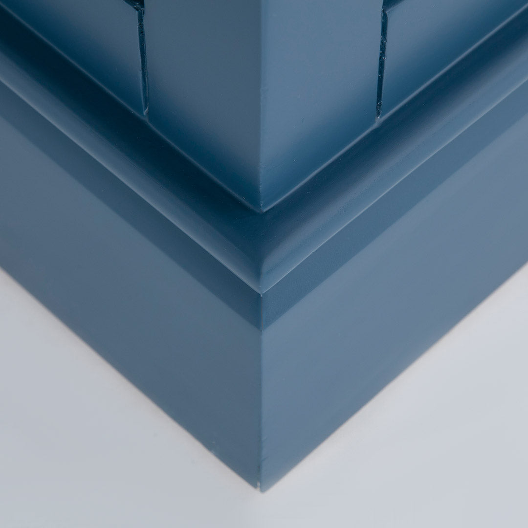 Close up of the painted blue plinth base on the Chichester Stiffkey Blue Large Sideboard