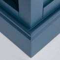 Close up of the plinth base on the Chichester Stiffkey Blue Grey Low Bookcase