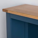 Close up of the oak top shelf on the Chichester Stiffkey Blue Grey Low Bookcase