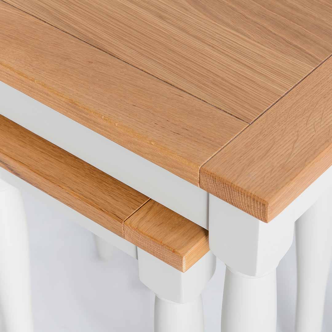 Close up of the oak tops  on the Chichester Ivory 2 Nested Tables