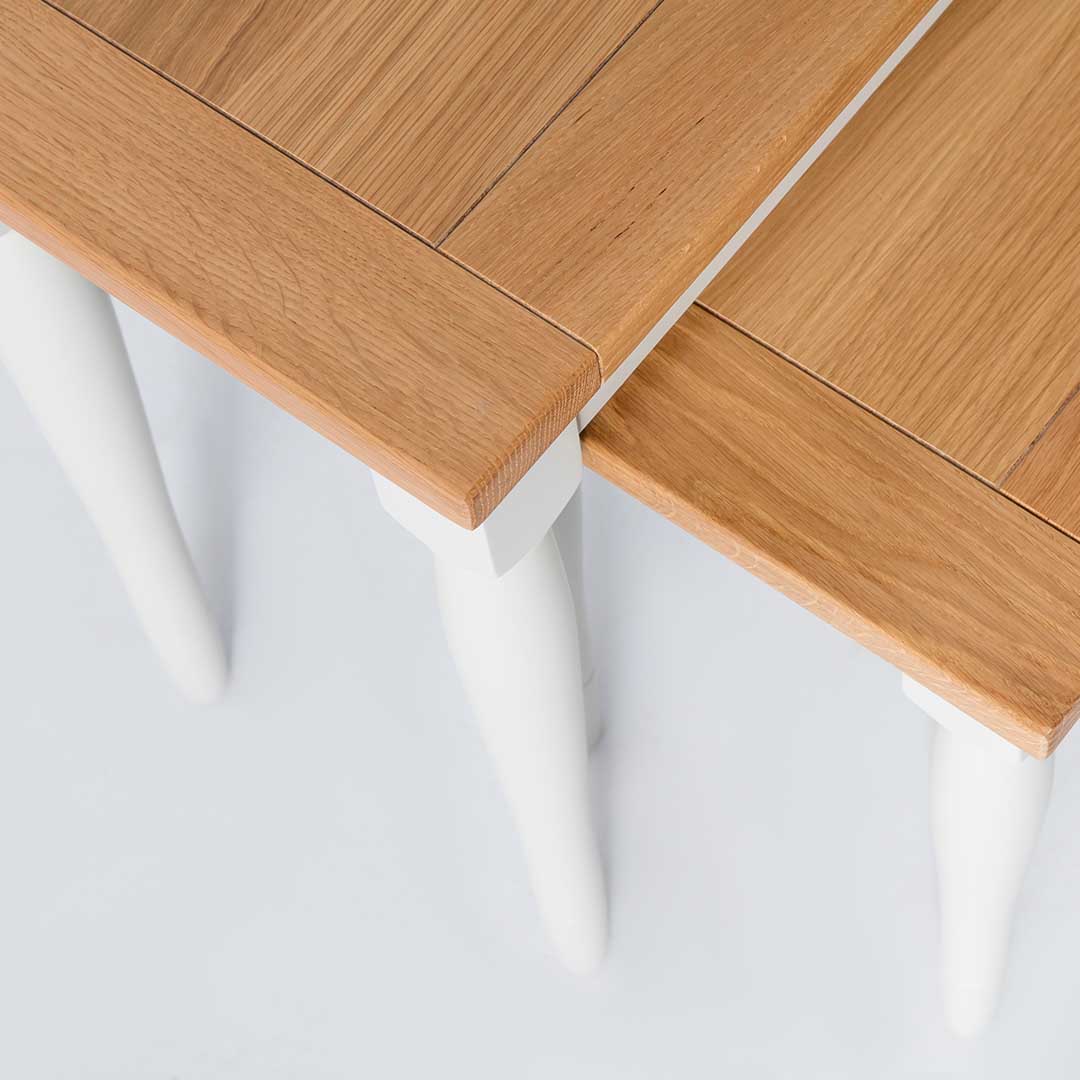 Close up of the oak tops on the Chichester Ivory Nest of Tables