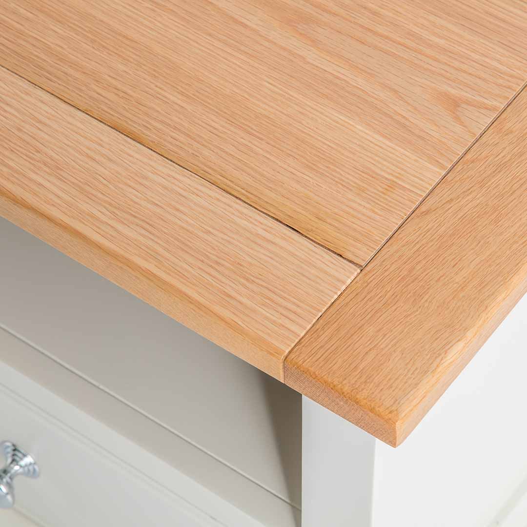 Close up of oak top on the Chichester Ivory Small TV Unit 