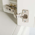 Close up of door hinge on the Chichester Ivory Cream Mini Cupboard