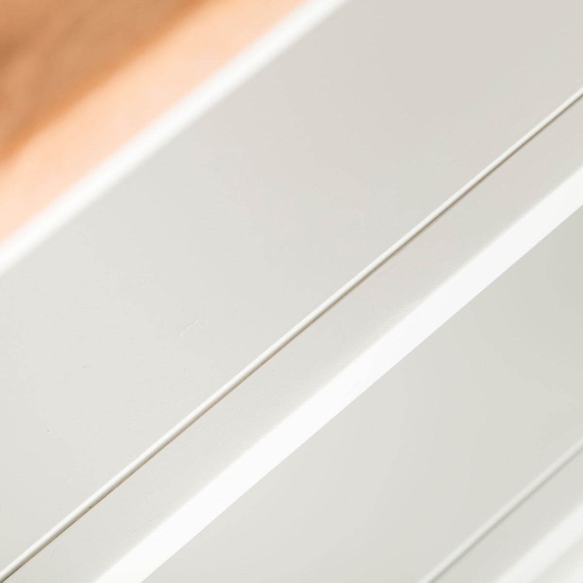 Close up of the fixed shelf on the Chichester Ivory Cream Mini Cupboard