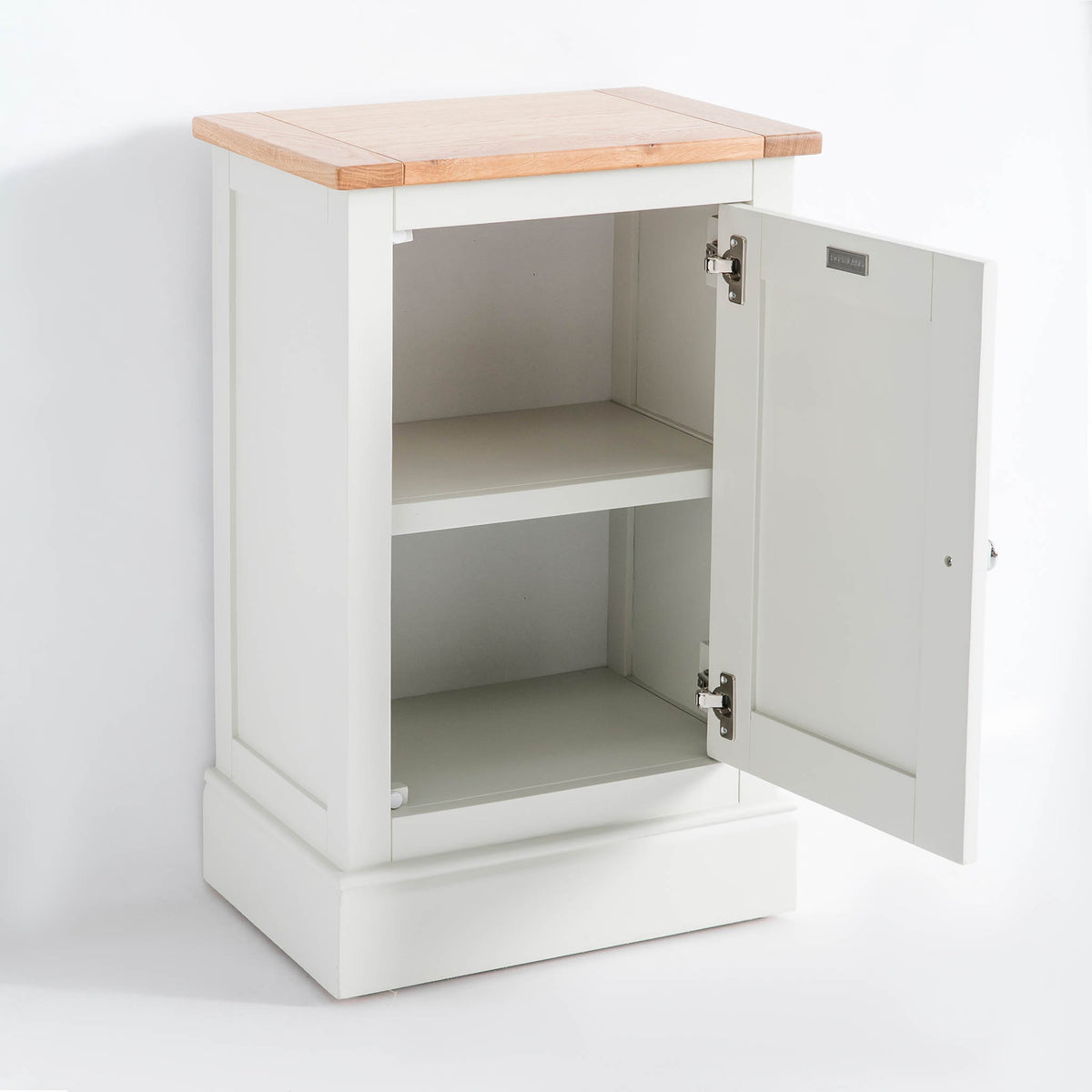 Opened door side view of the Chichester Ivory Cream Mini Cupboard