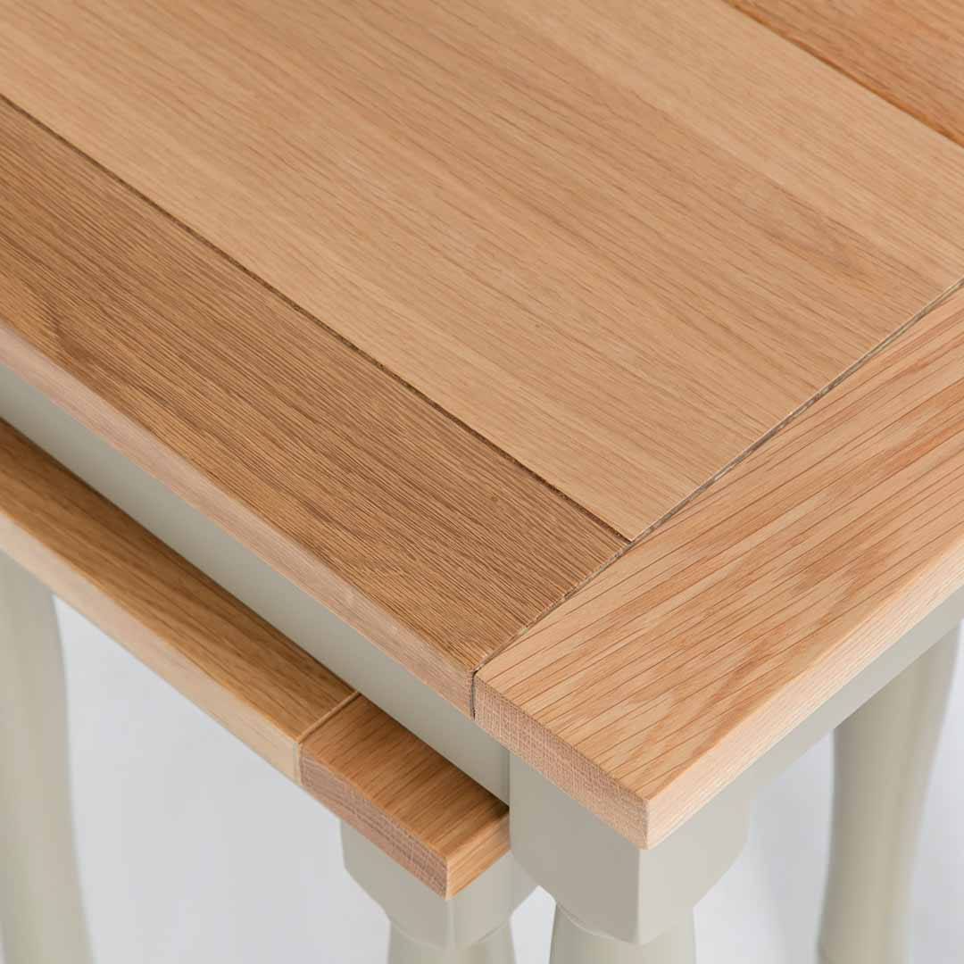 Close up of the oak tops on the Chichester Ledum Green 2 Nested Tables