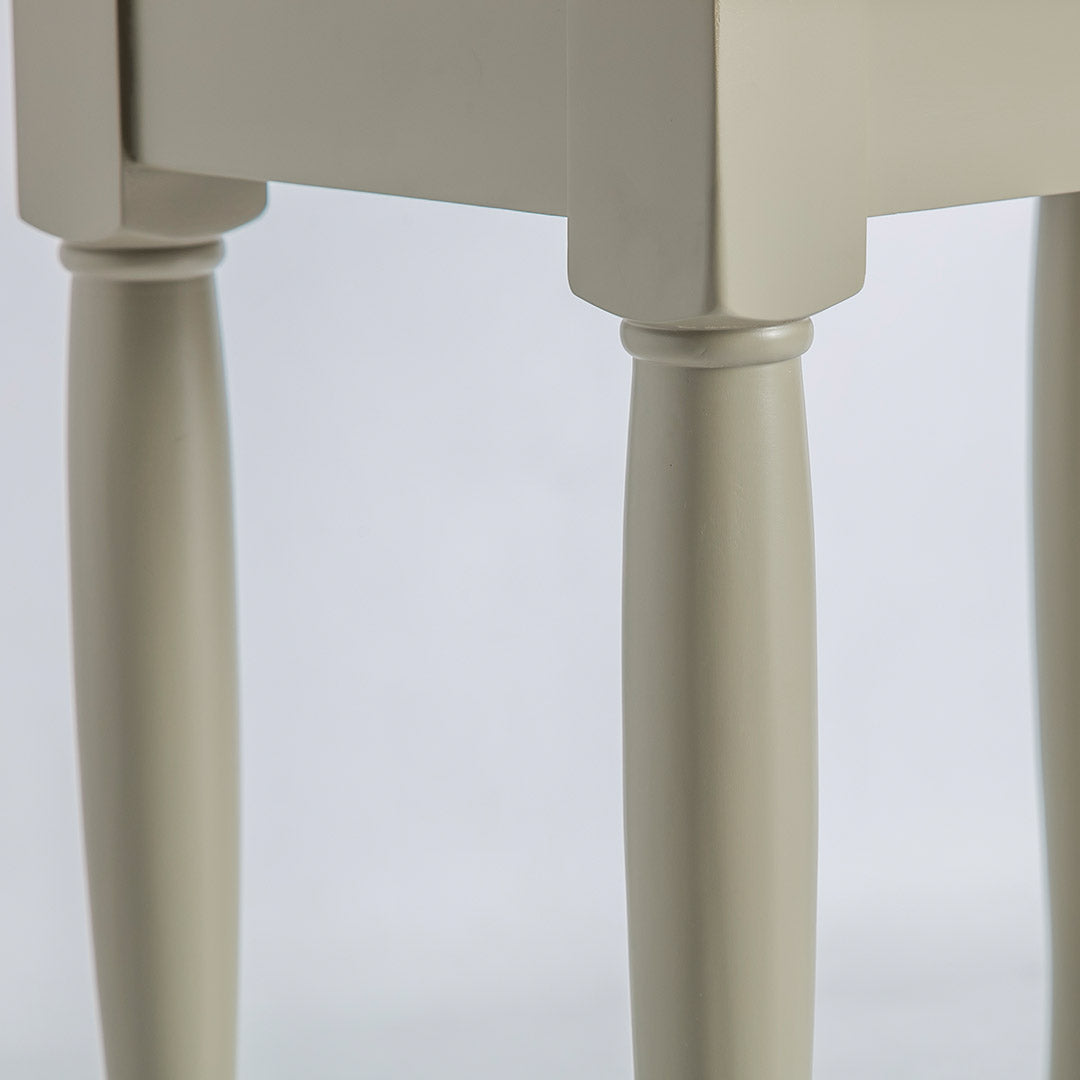 Close up of the curved legs on the Chichester Ledum Green Nest of Tables