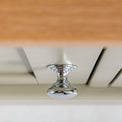 Close up of the round metal handles on the Chichester Ledum Green Small TV Unit