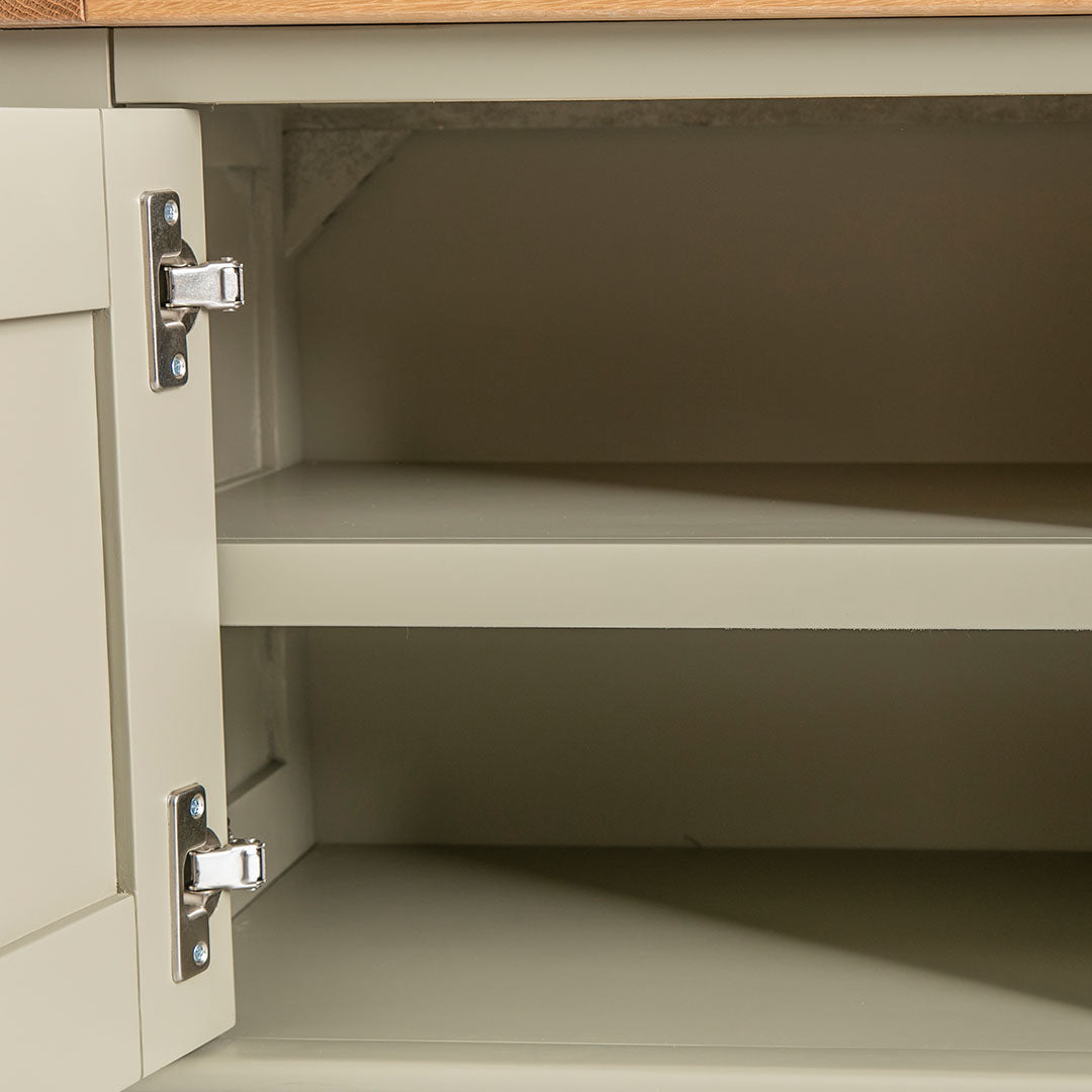 Close up of the cabinet fixed shelf on the Chichester Ledum Green Small TV Unit