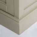 Close up of the plinth base on the Chichester Ledum Green Extra Large TV Unit