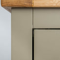 Close up of the painted green solid wood frame on the Chichester Ledum Green Mini Cupboard