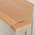 Close up of the oak top on the Chichester Ledum Green Corner Cupboard