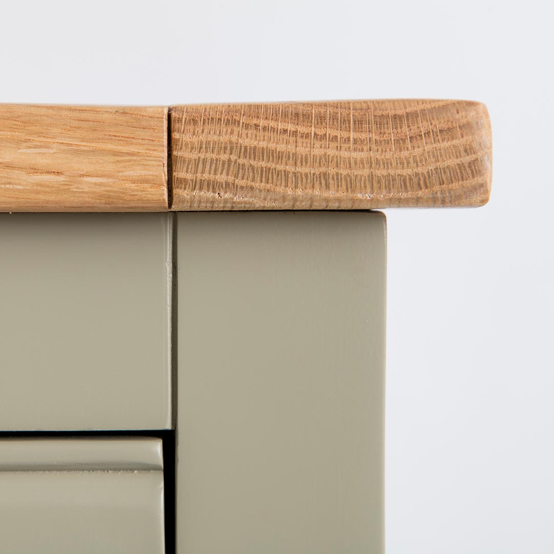 Close up of the oak top edge on the Chichester Ledum Green Extra Large Sideboard