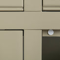 Close up of the painted green solid wood frame and door stopper on the Chichester Ledum Green Large Sideboard