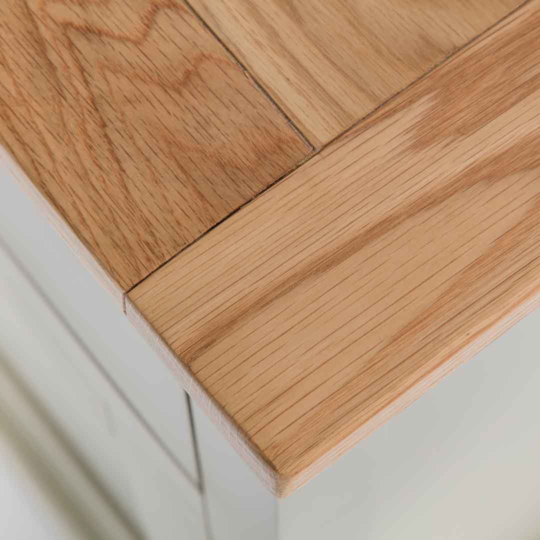 Close up of the oak top wood grain on the Chichester Ledum Green Large Sideboard