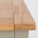 Close up of the oak top wood grain on the Chichester Ledum Green Extra Large Sideboard