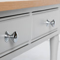 Close up of the round metal drawer handles on the Chichester Grey Coffee Table