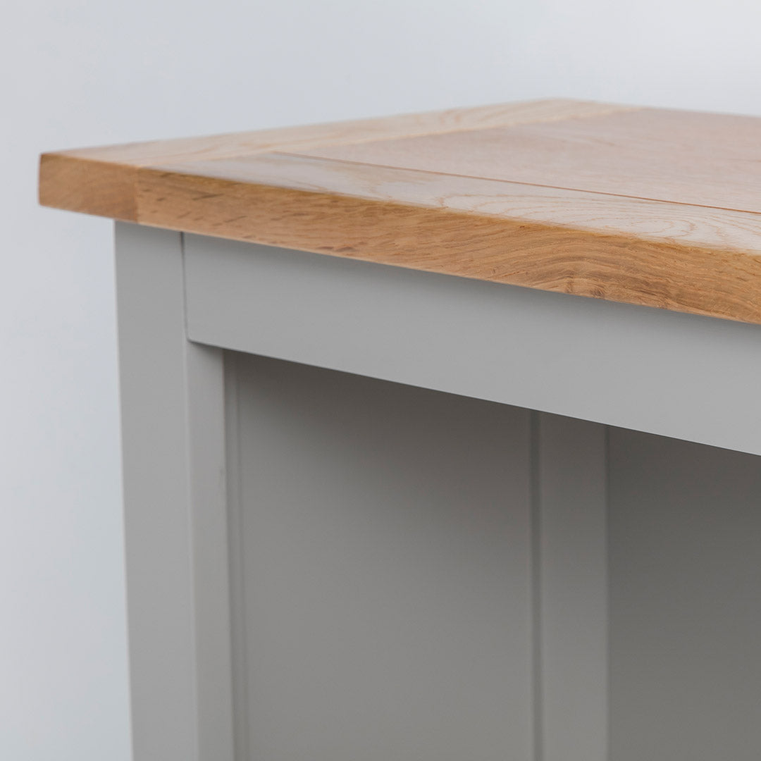 Close up of the oak top edge on the Chichester Chester Grey Small Bookcase