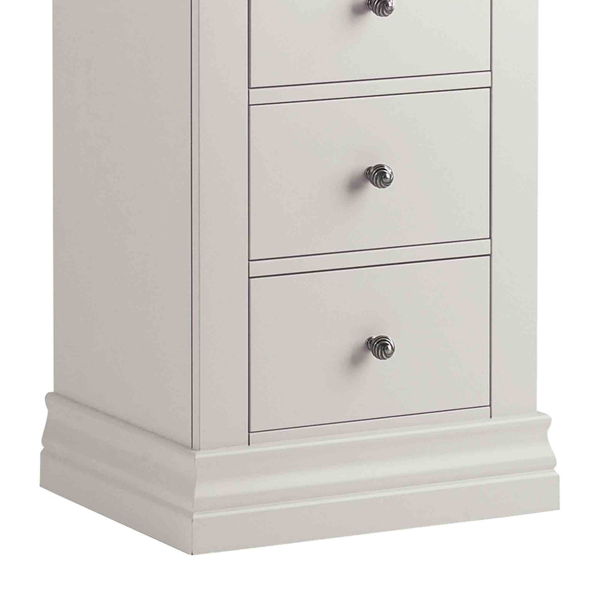 close up of plinth on the Melrose Cotton White Tallboy Chest