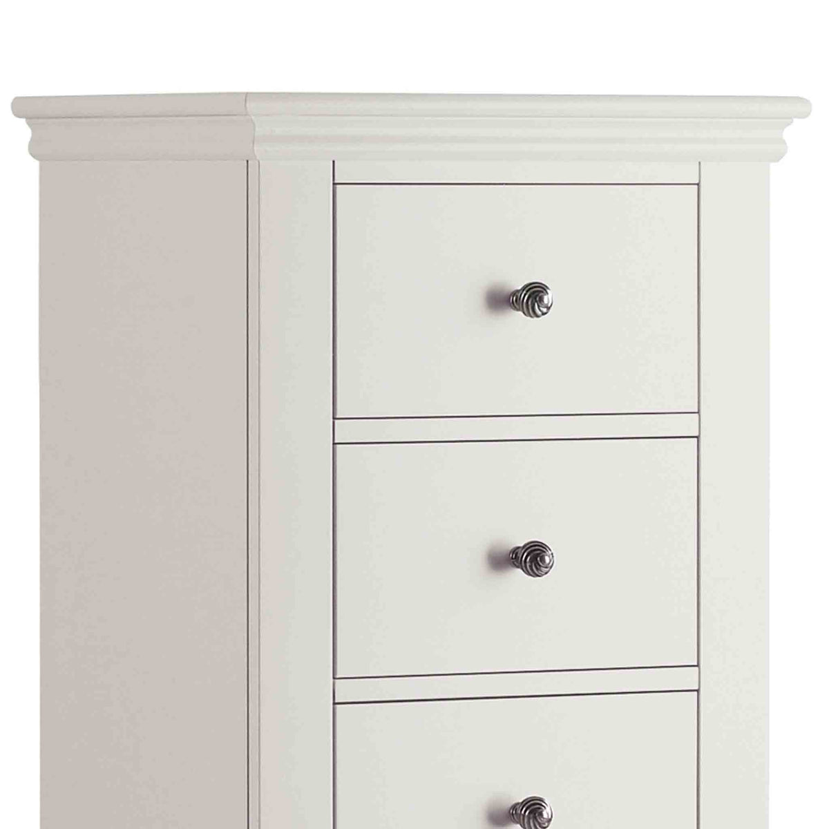 close up of cornice top on the Melrose Cotton White Tallboy Chest