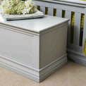 close up of the corniced top on the Melrose Cotton White Storage Chest