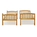 Two identical wooden beds with slatted headboards and footboards stand parallel against a white background.