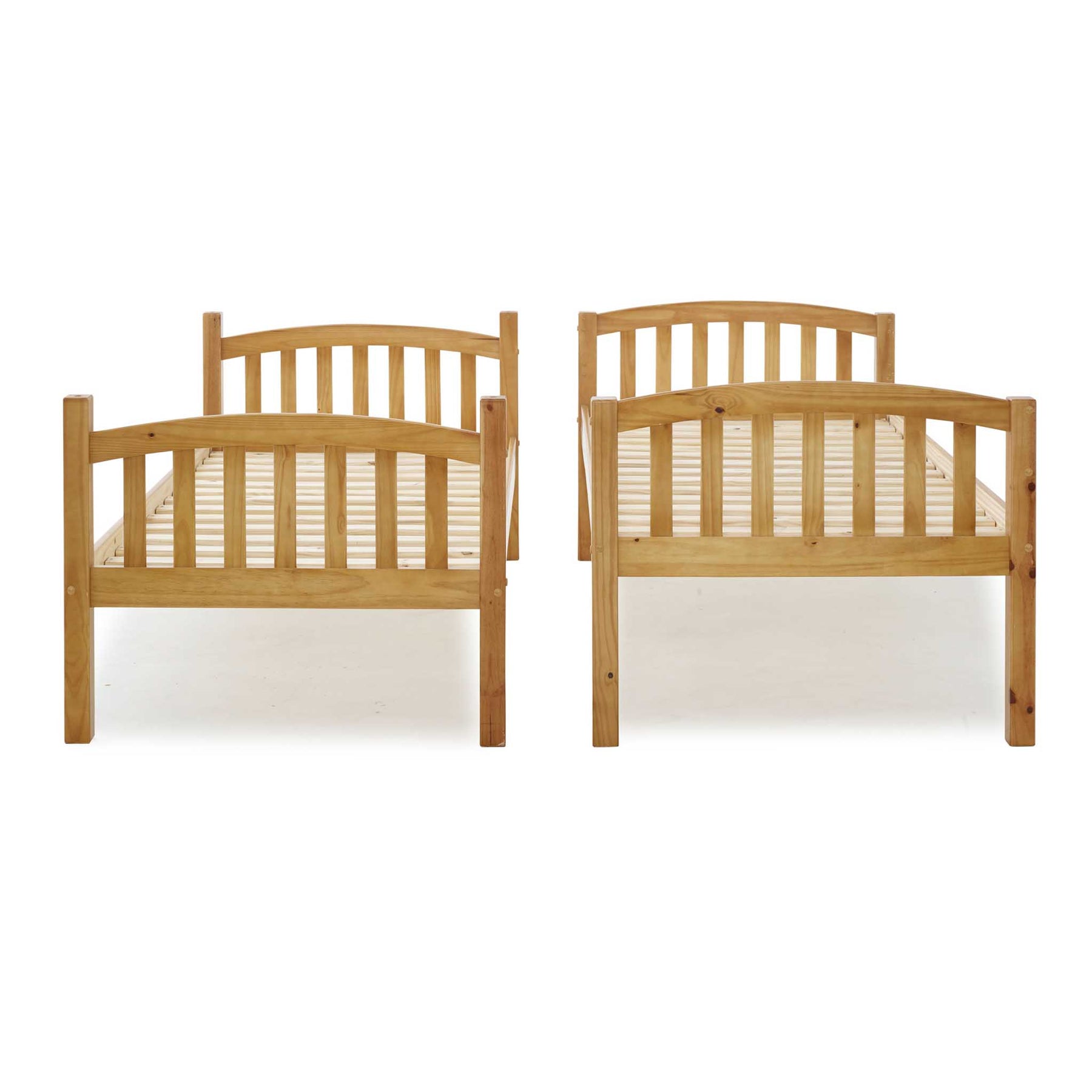 Two identical wooden beds with slatted headboards and footboards stand parallel against a white background.
