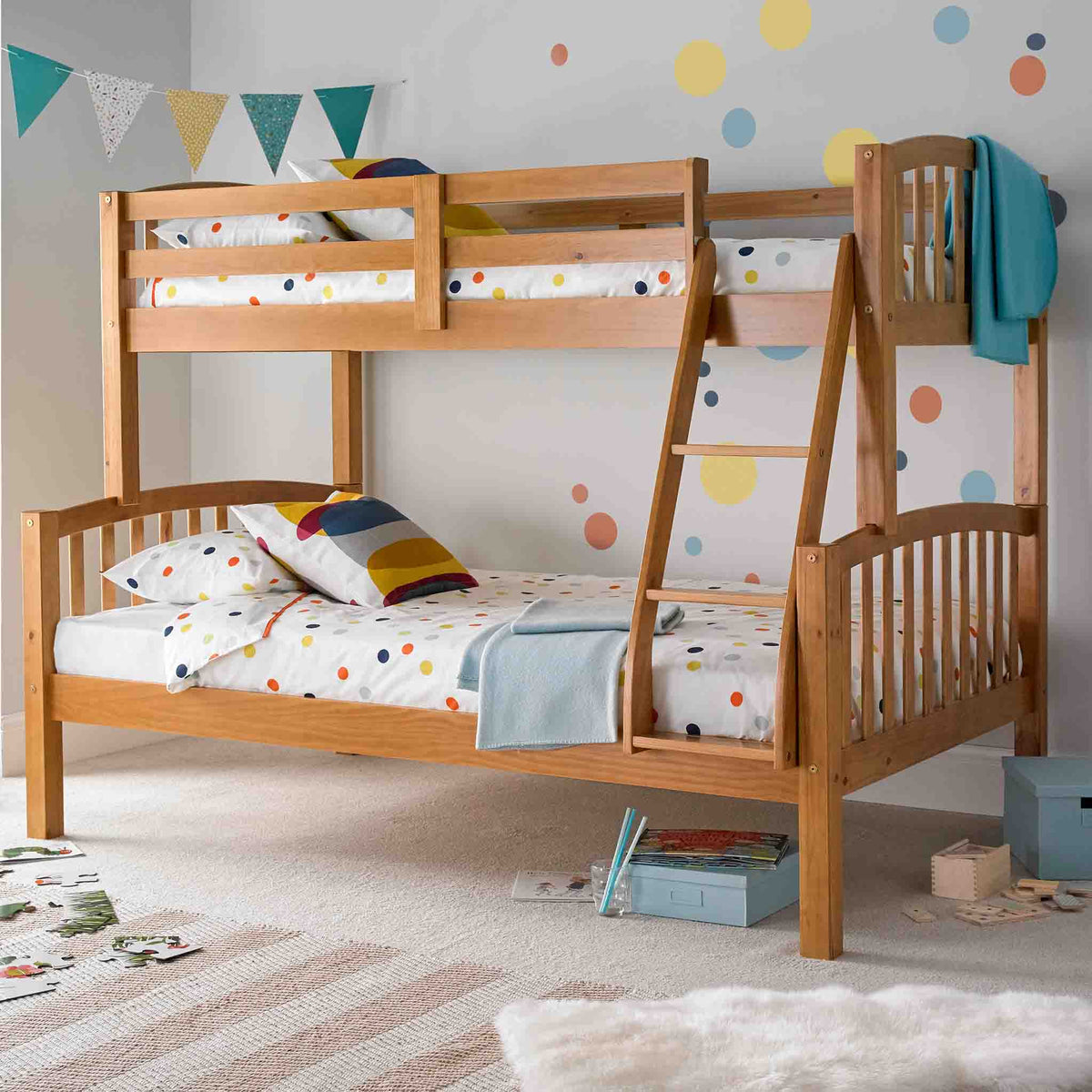 lifestyle image of the Liberty Pine Triple Sleeper Bunk Bed