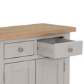 Close up of oak top and open drawer with wooden runners for Charlestown Grey Small Sideboard from Roseland Furniture