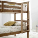 close up of the pine wooden frame on the Carlson Pine Detachable Single Bunk Beds