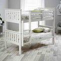Lifestyle image of the Carlson White Detachable Single Bunk Beds from Roseland Furniture