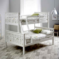 lifestyle image of the Carlson White Triple Sleeper Bunk Bed