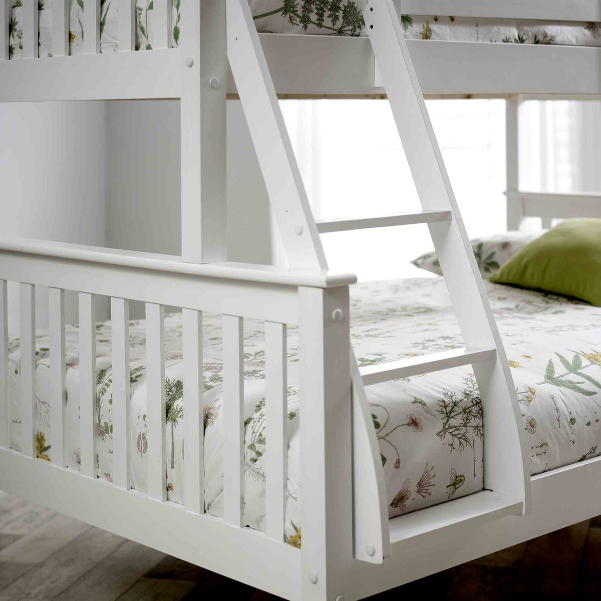 close up of the ladder on the Carlson White Triple Sleeper Bunk Bed