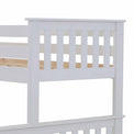 close up of slatted foot board on the Carlson White Triple Sleeper Bunk Bed