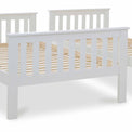 close up of the slatted foot board on the Carlson White Triple Sleeper Bunk Bed