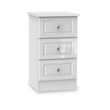A white three-drawer bedside table with crystal knobs, standing isolated against a pure white background.