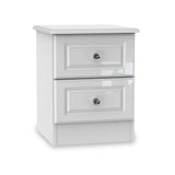 A white two-drawer bedside table with crystal knobs stands against a pure white background.