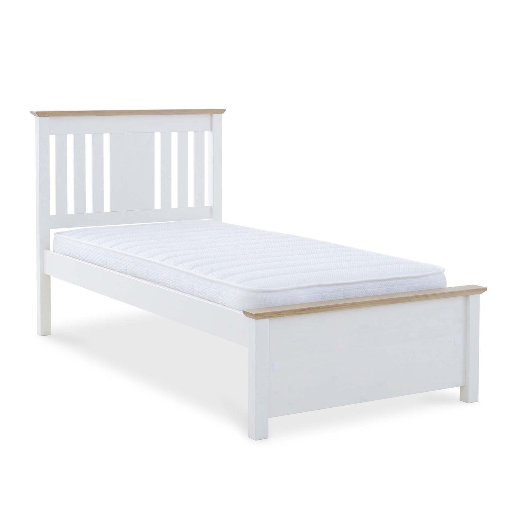A single white bed with a mattress, featuring a simple headboard and footboard, isolated against a white background.