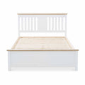 A white wooden double bed frame with slatted base, displayed against a plain white background.