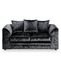 A black velvet sofa with three cushions is centered, isolated against a white background.